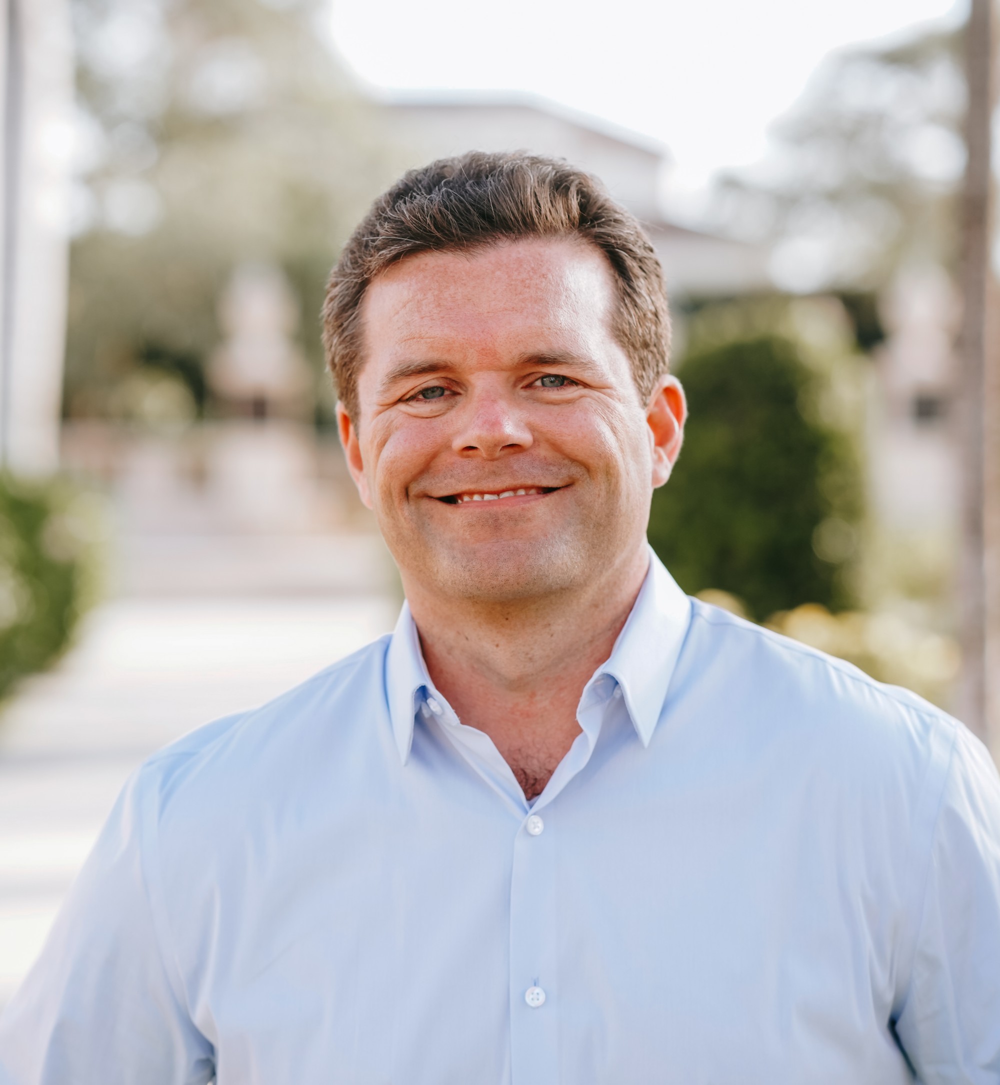 A high-tech, abstract AI neural network graphic with a central glow and radiating digital connections in vibrant red, matching the consultancy's branding.